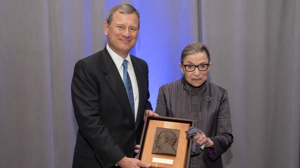 Chief Justice of the United States John G. Roberts, Jr. and Associate Justice Ruth Bader Ginsburg